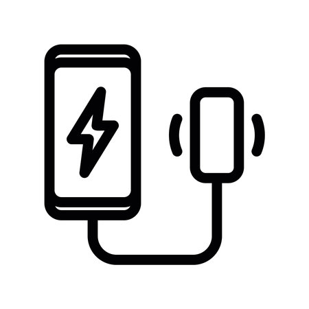 Mobile phone icon being powered up by an external adapterのイラスト素材