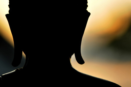 Backlight Silhouette of Buddha.の写真素材