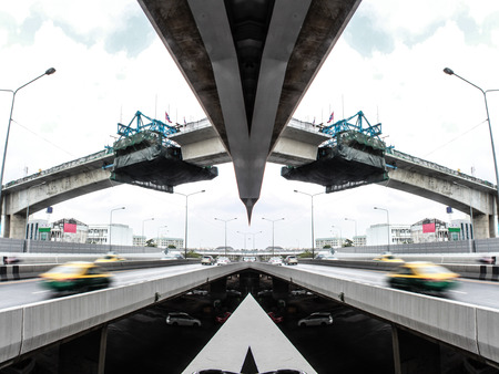 Reflection photo of Skytrain building in bangkokの素材 [FY31072334089]