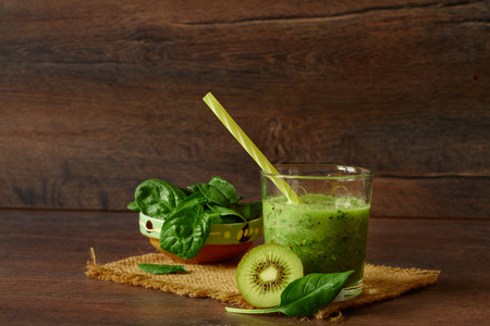 Blended smoothie with apple, kiwi and spinachの写真素材