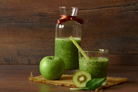 Blended smoothie with apple, kiwi and spinachの写真素材