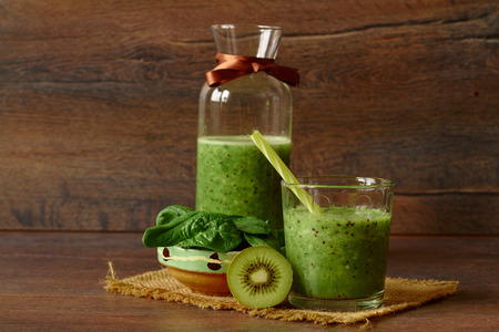 Blended smoothie with apple, kiwi and spinachの写真素材
