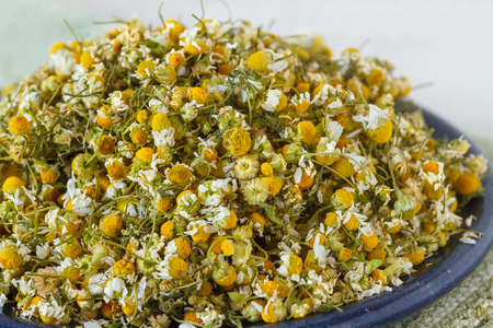 A pile of dried chamomile flowersの写真素材