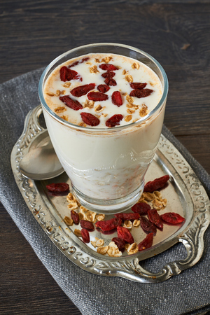 Homemade smoothie made from oats milk and goji beriesの写真素材