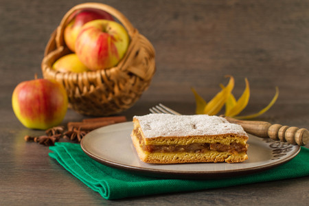 Home baked apple cake on rustic autumn tableの写真素材