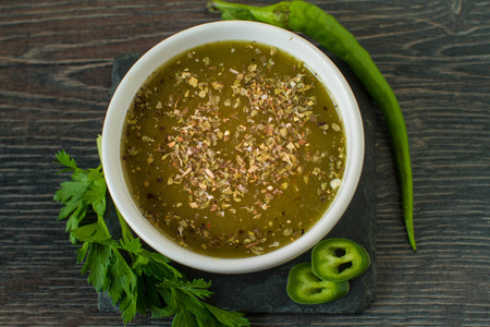 Mexican jalapeno sauce with ingredientsの写真素材