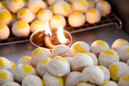 Thai desserts : Spring Roll pastry with nuts delicious in sweet food,Smell smoke steam candleの写真素材