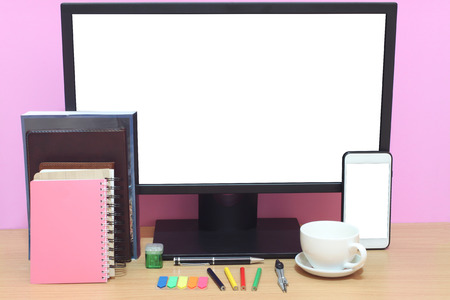 Laptop blank screen and books are placed on the desk and have copy space to the concept in your work.の写真素材