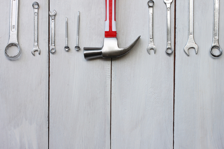 Happy labor day united states concept tool technician placed on a white wooden floor for your...