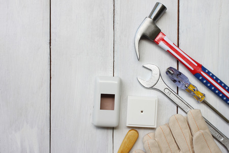 Happy labor day united states concept tool technician placed on a white wooden floor for your design.の写真素材