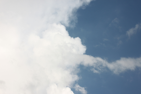White clouds and blue sky background to for your design.の写真素材