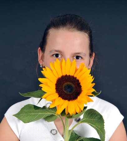 girl with sun flowerの写真素材