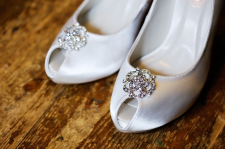 Closeup of brides shoes showing detail on wedding dayの写真素材