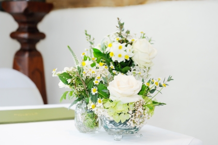 Closeup  of flower arrangement decorating ceremony room at weddingの写真素材