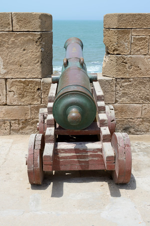Portuguese cannon in fortress battlements facing the seaの写真素材