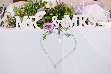 Decoration at wedding reception is heart shape with mr & mrsの写真素材