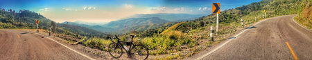 riding a bicycle on hill. doi chang, chiang rai, thailand