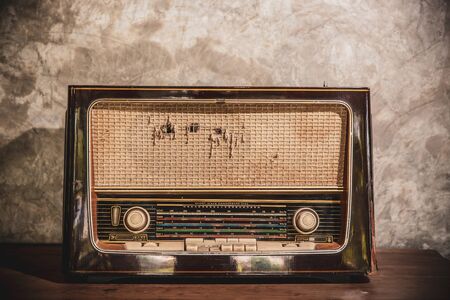 antique radio on vintage backgroundの写真素材