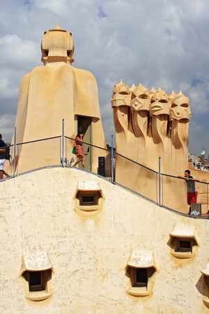 BARCELONA - AUGUST 31: Casa Mila La Pedrera building roof and chimneys on August 31, 2010 in Barcelona. Casa Mila is one of buildings created by Antonio Gaudi.のeditorial素材