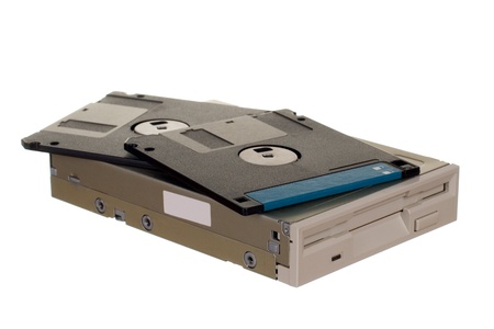 Floppy disk drive with diskettes isolated over white