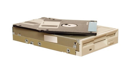 Floppy disk drive with diskettes isolated over white