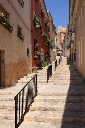 Old Narrow Street and Stairs Sidewalk in Biar Alicante Spain . Biar is the part of Route of the Castles of Vinalopoのeditorial素材