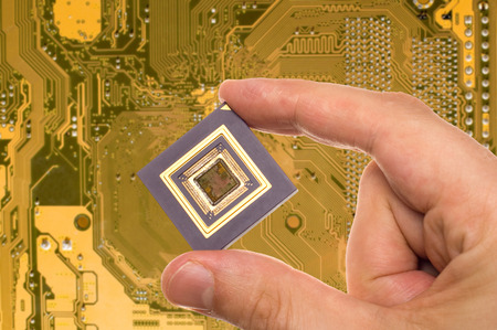 Microprocessor in hand over printed circuit board