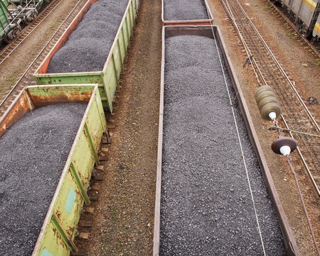 Coal trains at railway stationの写真素材