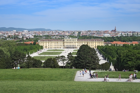 Vienna, Austria, April, 30, 2018. Tourists walk around the Royal Palace Schoenbrunn in Vienna, Austria. This Palace was the summer residence of Austrian Emperors.の写真素材
