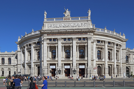 Vienna, Austria, May, 6 , 2018. Tourists walk near Hofburg Theater. This is the main theater of Vienna and stays on the populartouristic street Ringstrasse.のeditorial素材