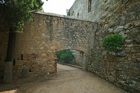 Tarragona Passeig arqueologic (Archaeological Promenade) under Roman era wallsの写真素材