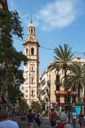 Valencia, Spain - September, 12, 2018. People walk by the church of Saint Catherine (Santa Caterina). The church has unusual decoration of gun barrels - which make in the popular historical landmark of the cityのeditorial素材