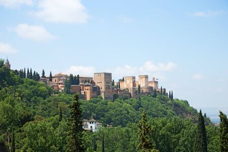 View to Alhambra form Sacromonte village famous for its houses made in caves at the hill slopes, Granada, Spainの写真素材