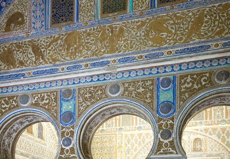 Seville, Spain - May, 9, 2019. Wall with peacocks in Seville Alcazar. It is a royal palace in Seville, Spain, built for the Christian king Peter of Castile. Is a UNESCO World Heritageのeditorial素材