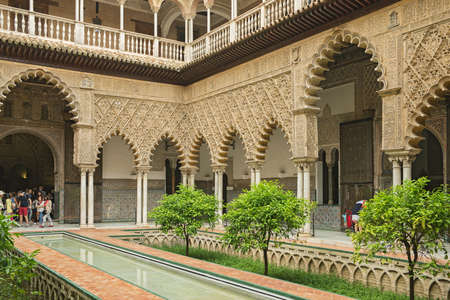 Seville, Spain - May, 9, 2019. Seville Alcazar Patio de las Doncellas (Courtyard of the Maidens). It is a royal palace in Seville, Spain, built for the Christian king Peter of Castile. Is a UNESCO World Heritageのeditorial素材