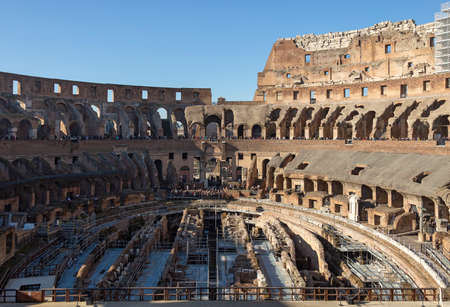 Rome, Italy - January, 5, 2020. Tourists visit Colosseum ruins in Rome. It is the greatest roman building in the world.のeditorial素材