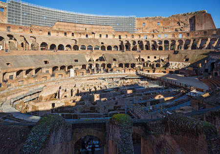 Rome, Italy - January, 5, 2020. Tourists visit Colosseum ruins in Rome. It is the greatest roman building in the world.のeditorial素材