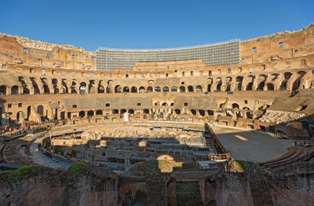 Rome, Italy - January, 5, 2020. Tourists visit Colosseum ruins in Rome. It is the greatest roman building in the world.のeditorial素材
