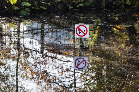 No fishing sign in a pond in the Netherlandsの写真素材