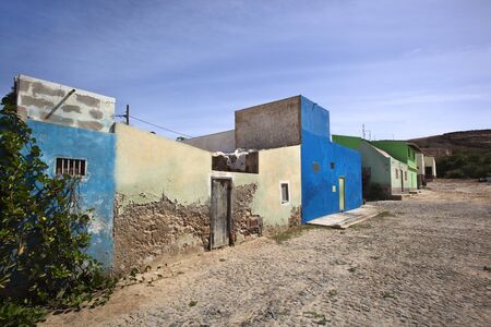 Paved street with colorful houses in Bofareira on the island Boa Vista of Cape Verde