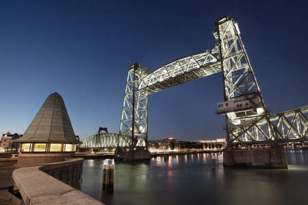 Famous old railroad bridge De Hef in the evening in Rotterdam