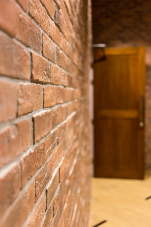 Brick Wall And The Door in House.の写真素材
