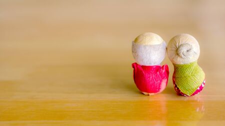 old couple japanese on wood background.の写真素材