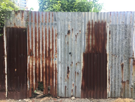 Old and rusty zinc wall backgroundの写真素材