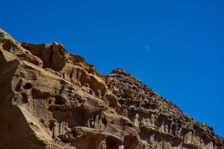 Wadi Rum Mountain and the moon in Jordan