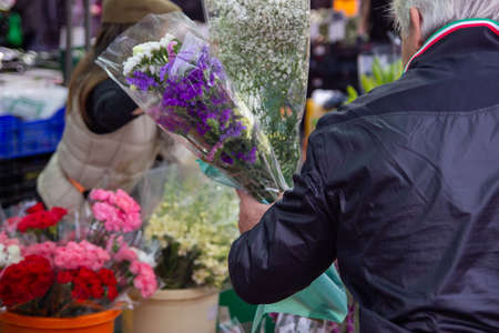 Man buying flowers in Spainの写真素材