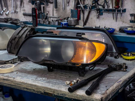 Car headlights in paint shopの写真素材