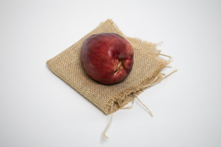 Fresh red apple on sackingの写真素材