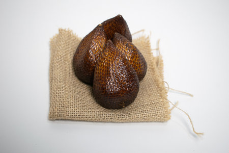 Salak fruit is placed on a piece of burlapの写真素材