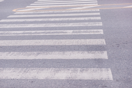 old zebra crossing on the roadの写真素材